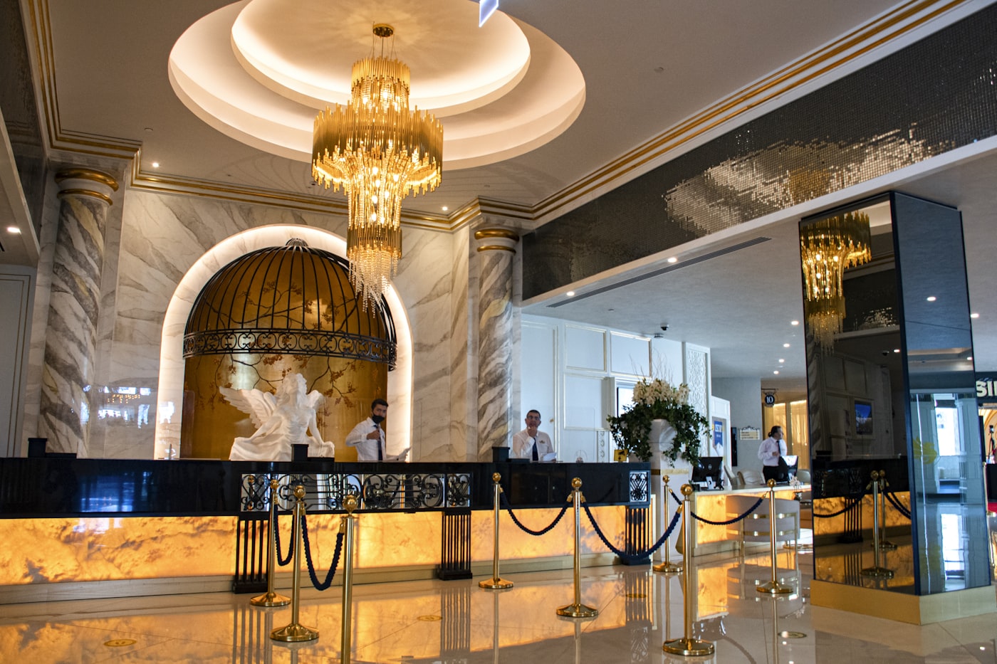 Grand luxury hotel lobby with chandelier