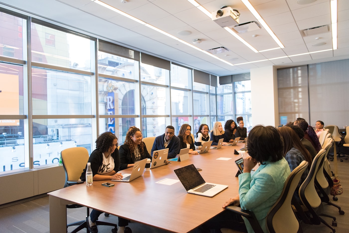 Diverse team in a business meeting around a boardroom table