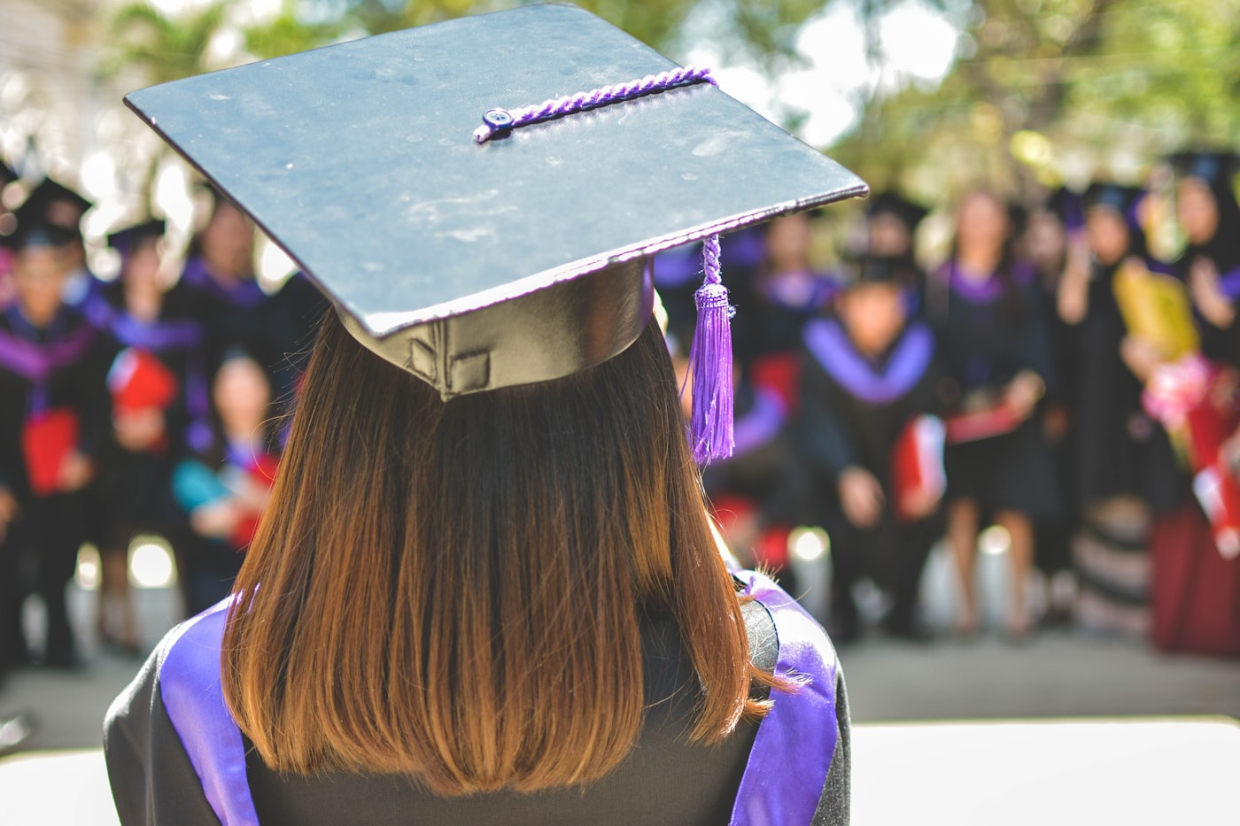 Graduate watching her degree ceremony