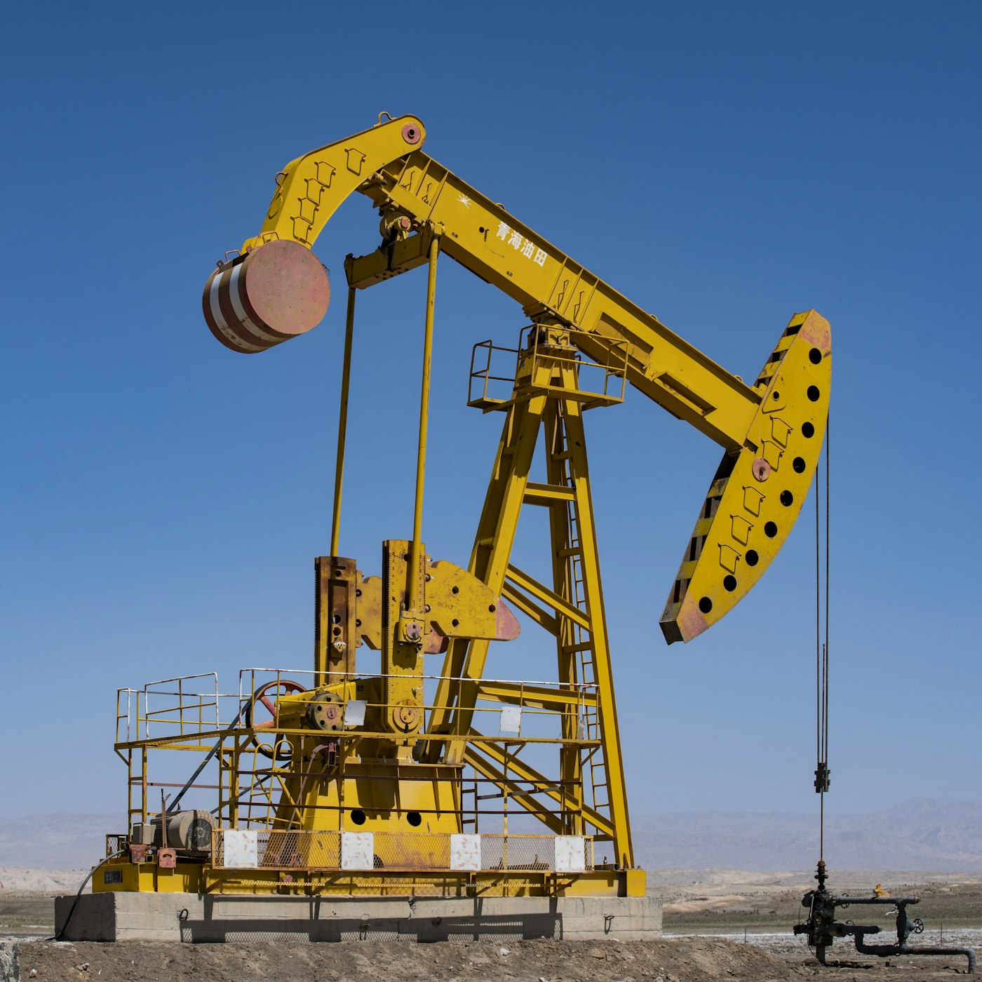 Oil pumpjack against the sky